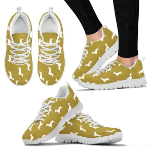 Brownish sneaker, white soles and white dachshunds