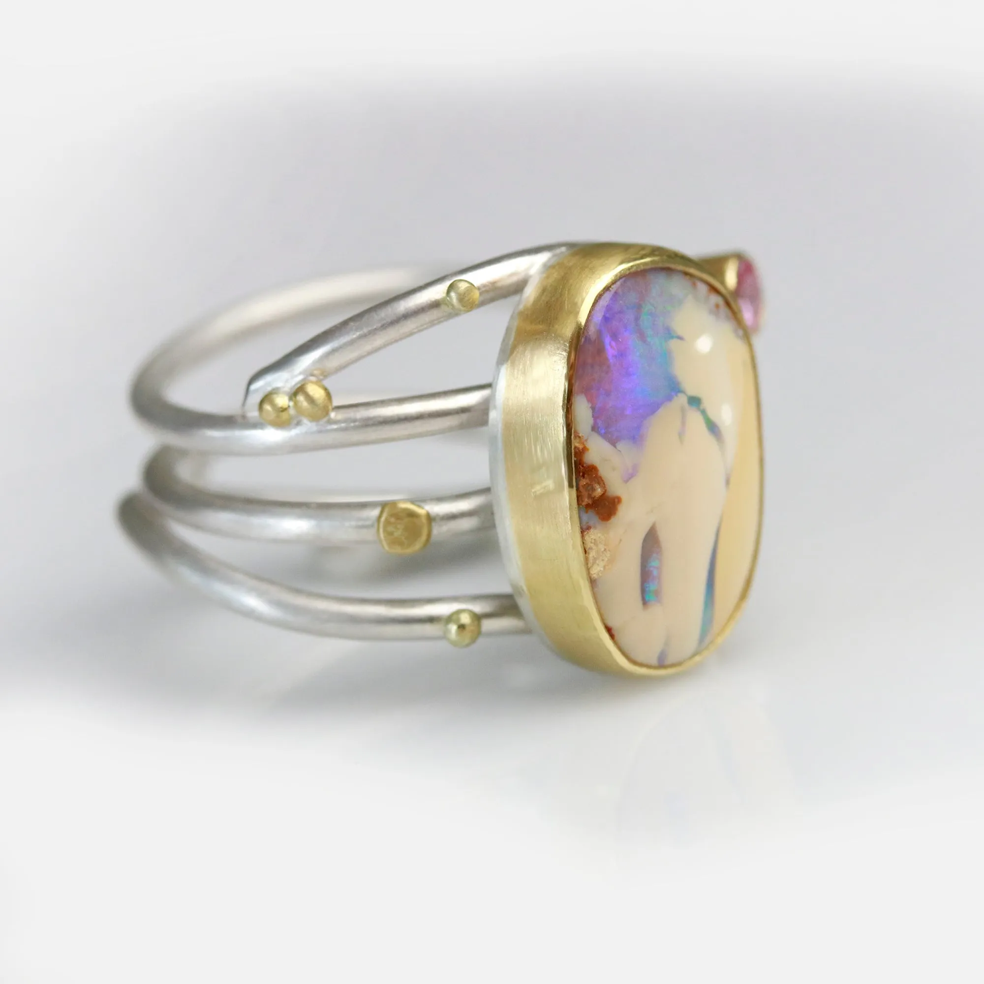 SOLD  Boulder Opal and Pink Sapphire on Swirled Band Ring. Size 6 3/4.