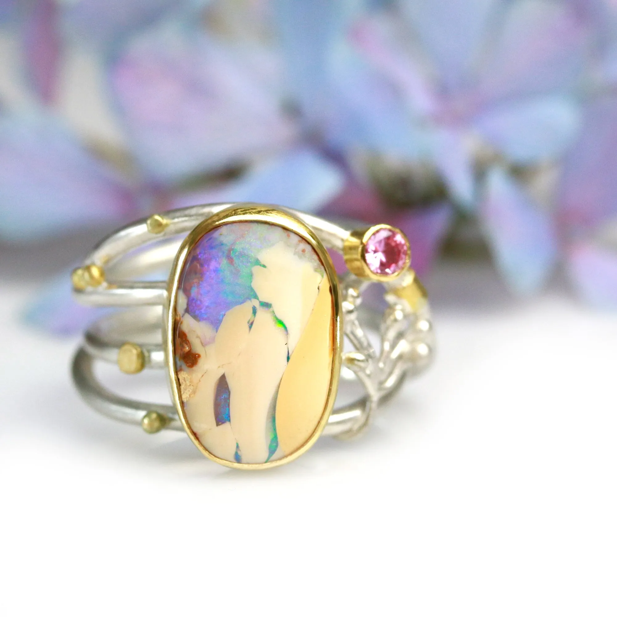 SOLD  Boulder Opal and Pink Sapphire on Swirled Band Ring. Size 6 3/4.