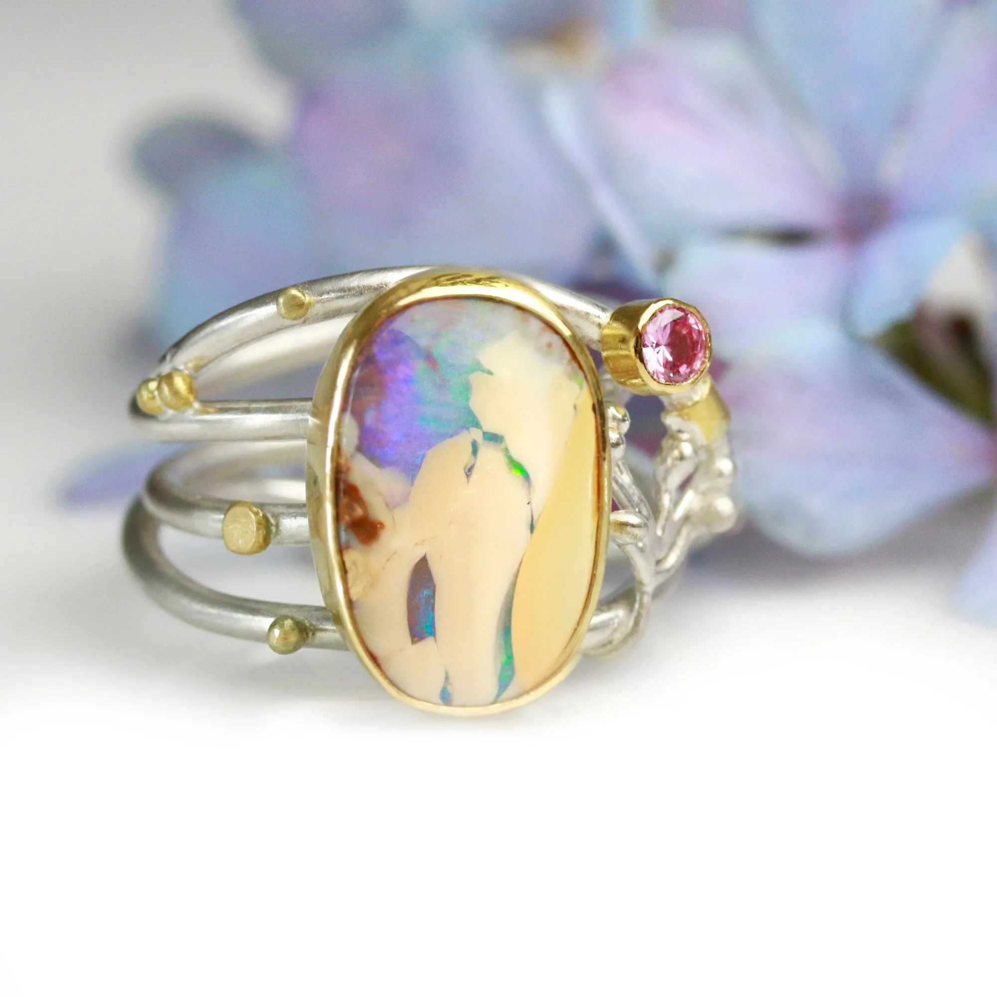 SOLD  Boulder Opal and Pink Sapphire on Swirled Band Ring. Size 6 3/4.