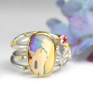 SOLD  Boulder Opal and Pink Sapphire on Swirled Band Ring. Size 6 3/4.