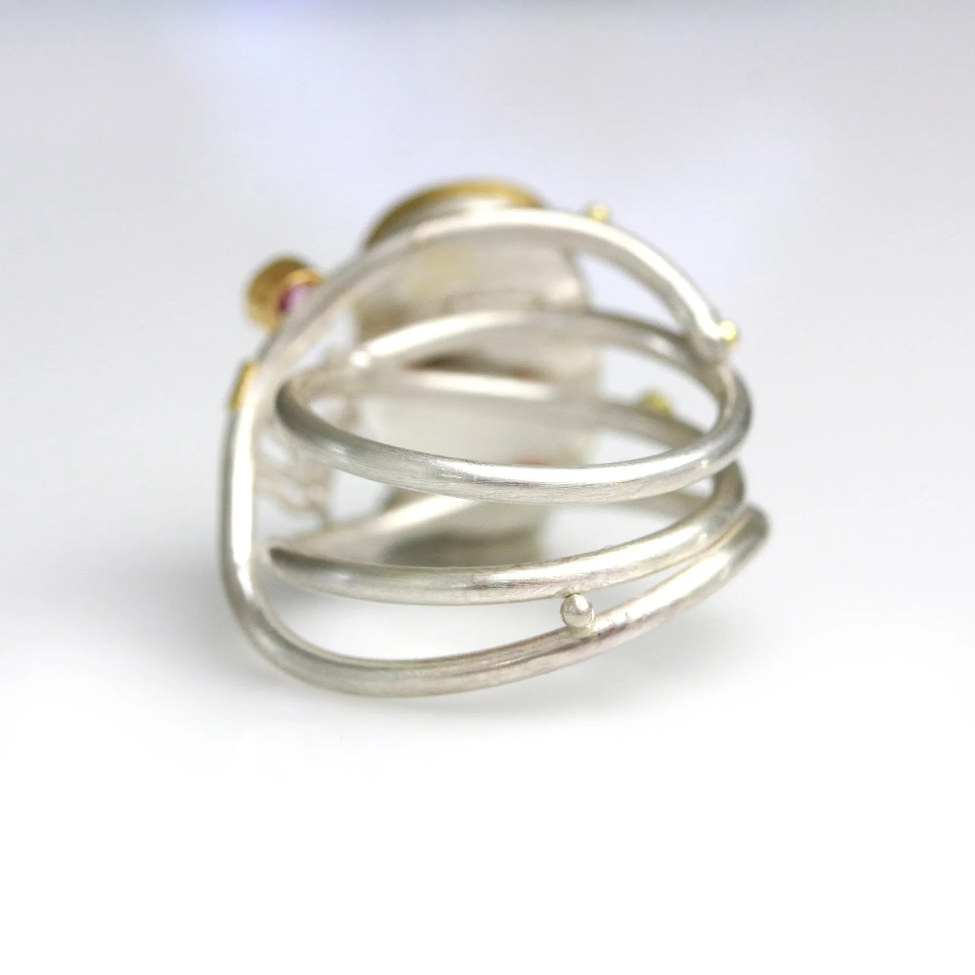 SOLD  Boulder Opal and Pink Sapphire on Swirled Band Ring. Size 6 3/4.
