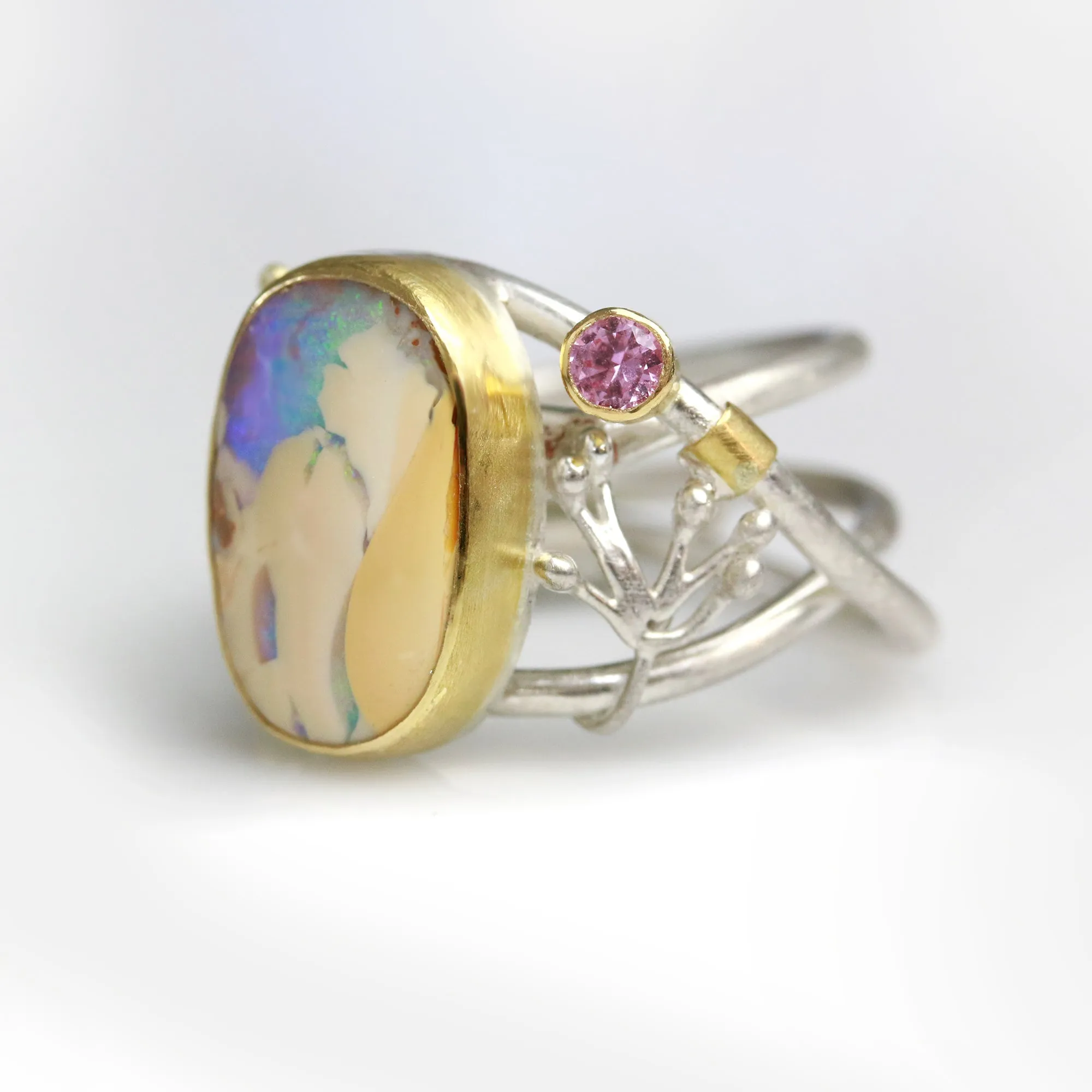 SOLD  Boulder Opal and Pink Sapphire on Swirled Band Ring. Size 6 3/4.